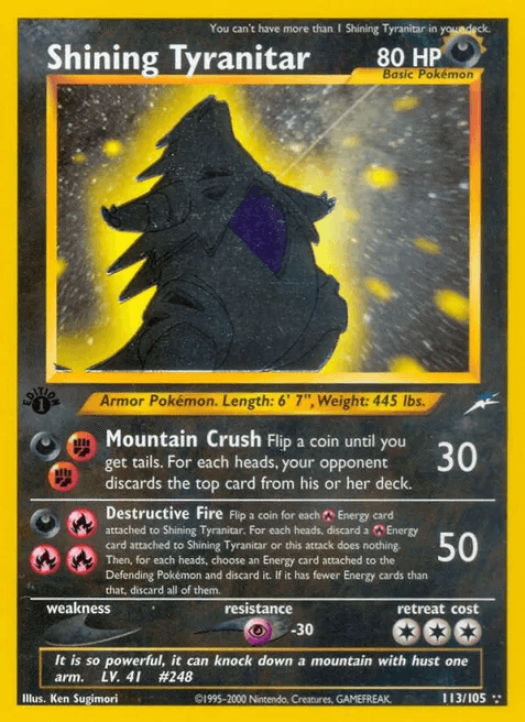 Shining Tyranitar first edition holofoil card from the Neo Destiny expansion, featuring foil embossing on the character